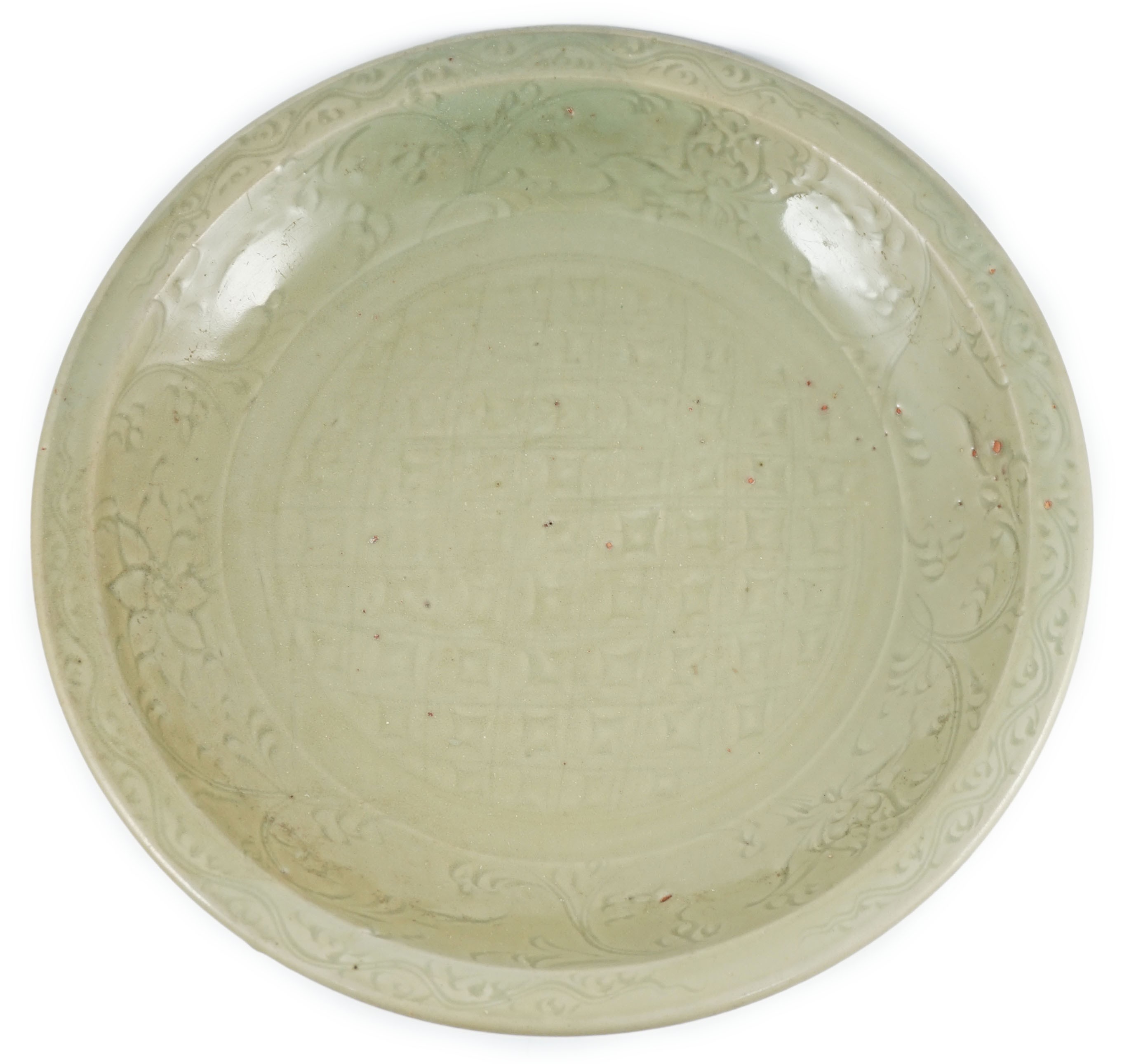A Chinese Ming Longquan celadon ‘diaper and floral’ charger, 15th century, 45cm diameter, wear to glaze